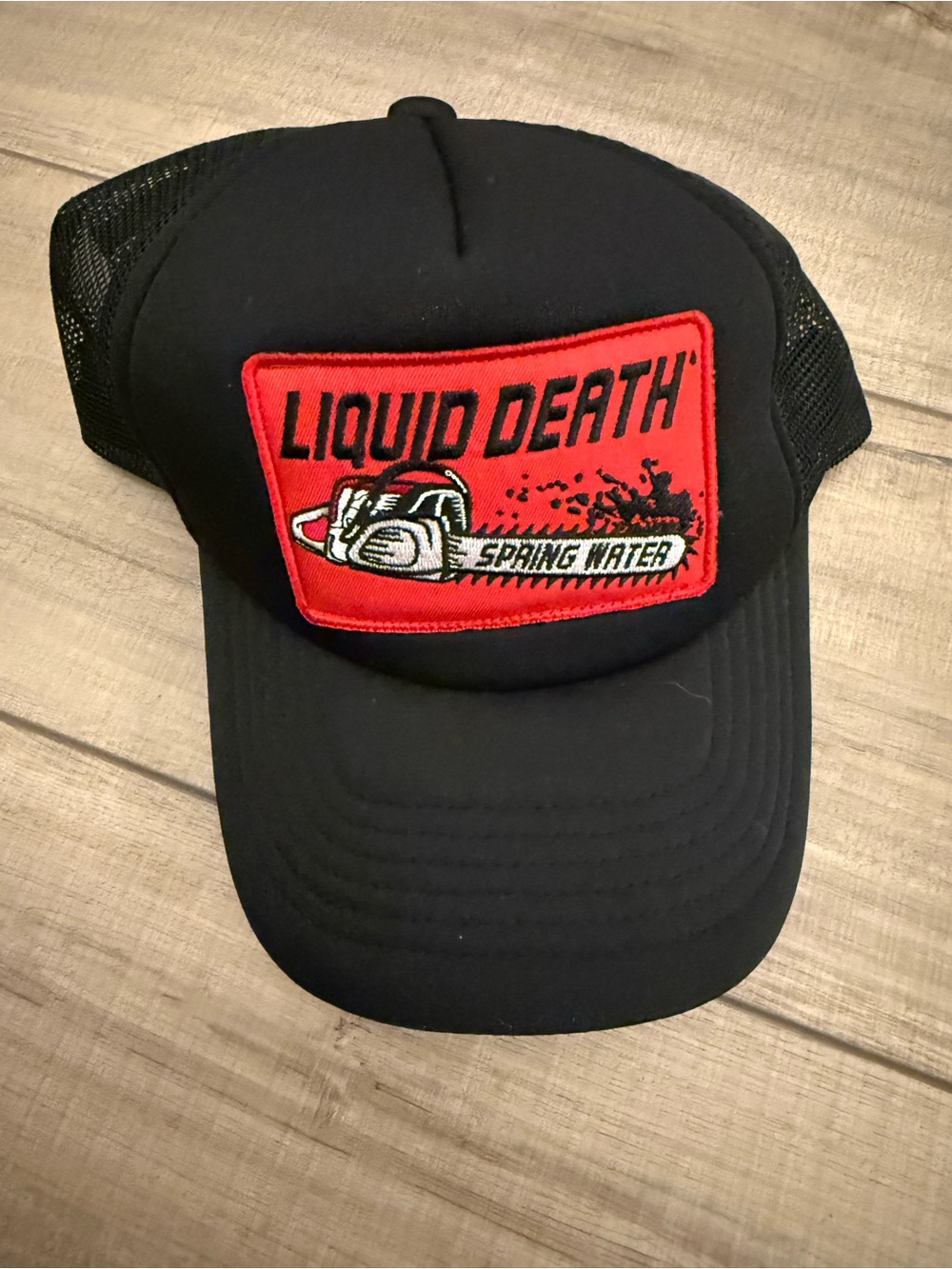 Liquid Death Black Trucker Hat with Red Patch